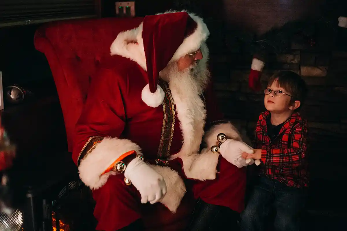 Santa talks with a child on the Virginia Scenic Railway train ride