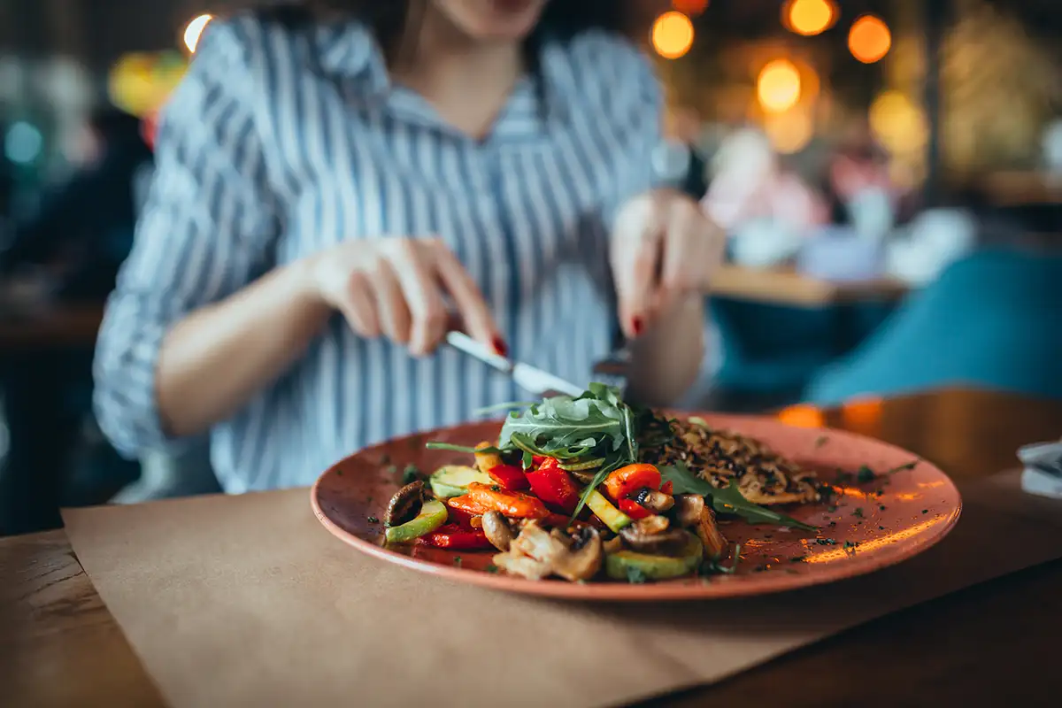Woman eating alone