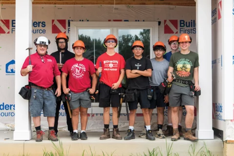 FCPS Students holding tools