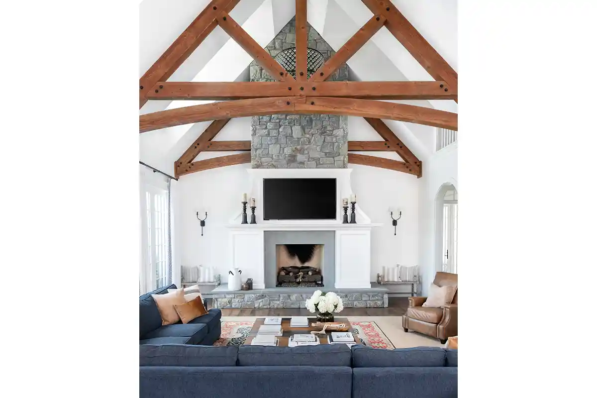 Beam work gives the great room a homey feel. (Photo by Laura Meztler Photography)
