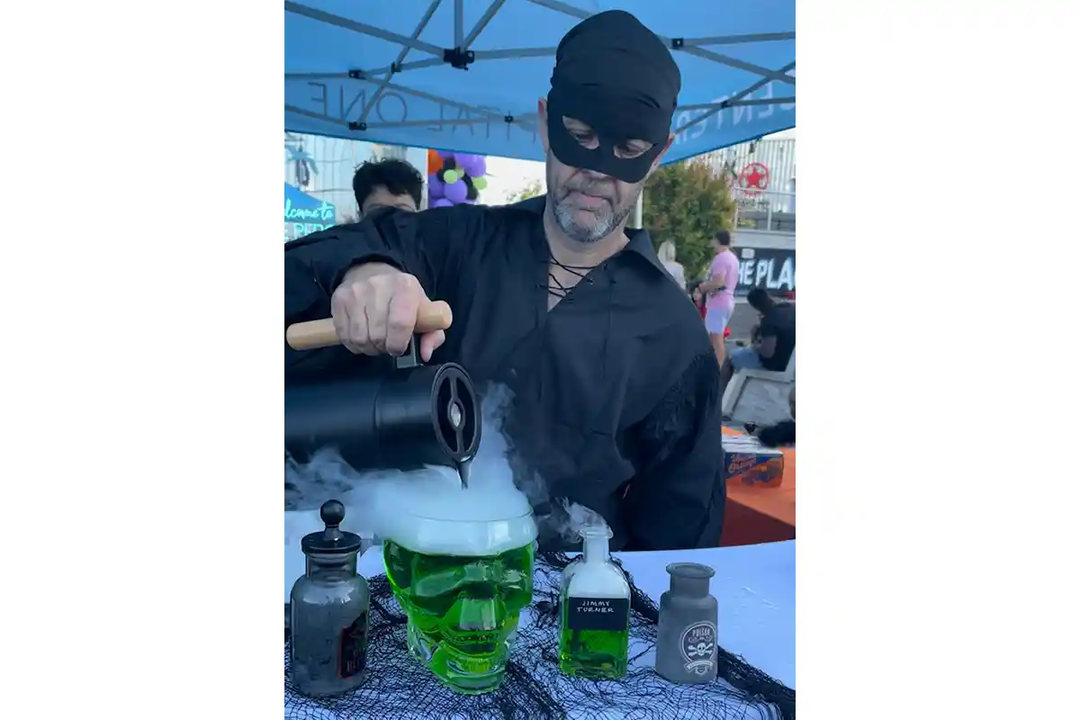 smoking green drink in a skull bowl