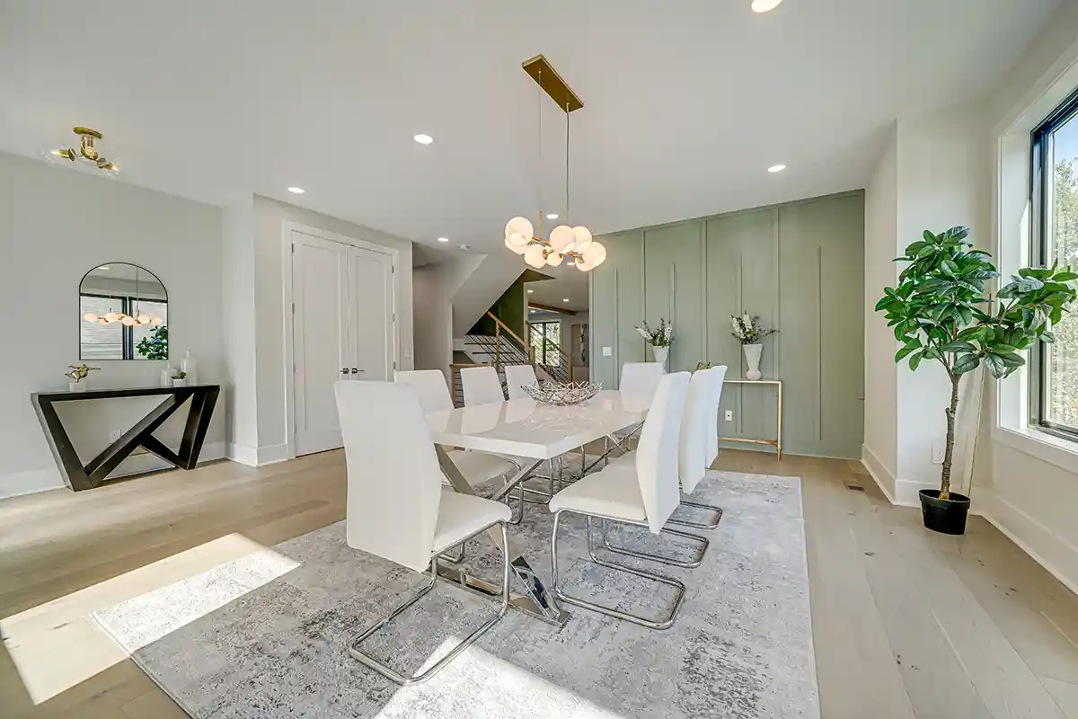 white dining room with chandelier 
