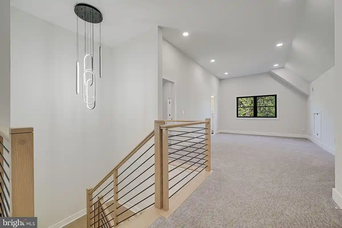 loft with carpeted floors