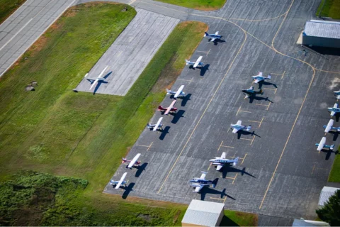 Overhead view of small airplanes at an airport