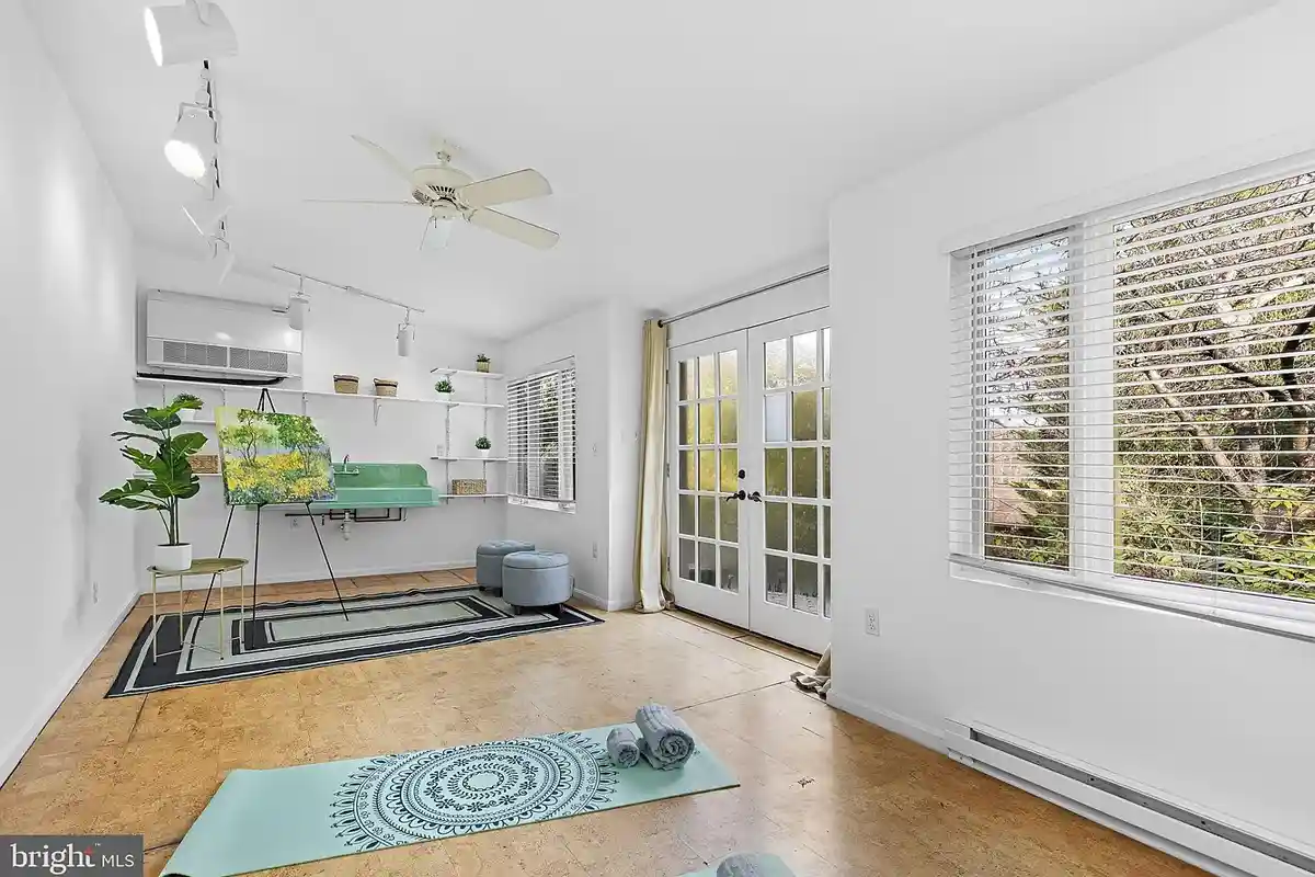 workout room with sink and french doors