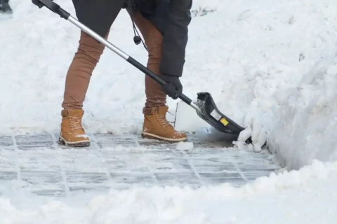 person shoveling snow