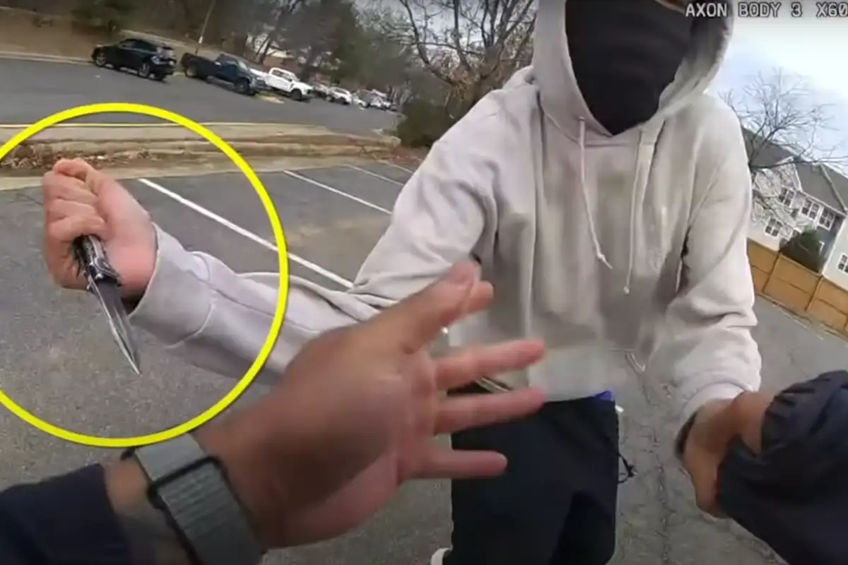 Suspect holding knife in body-worn camera footage