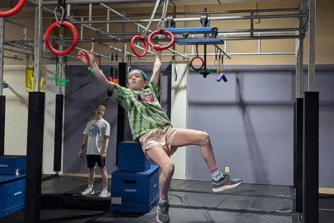 kid doing obstacle course at always in motion