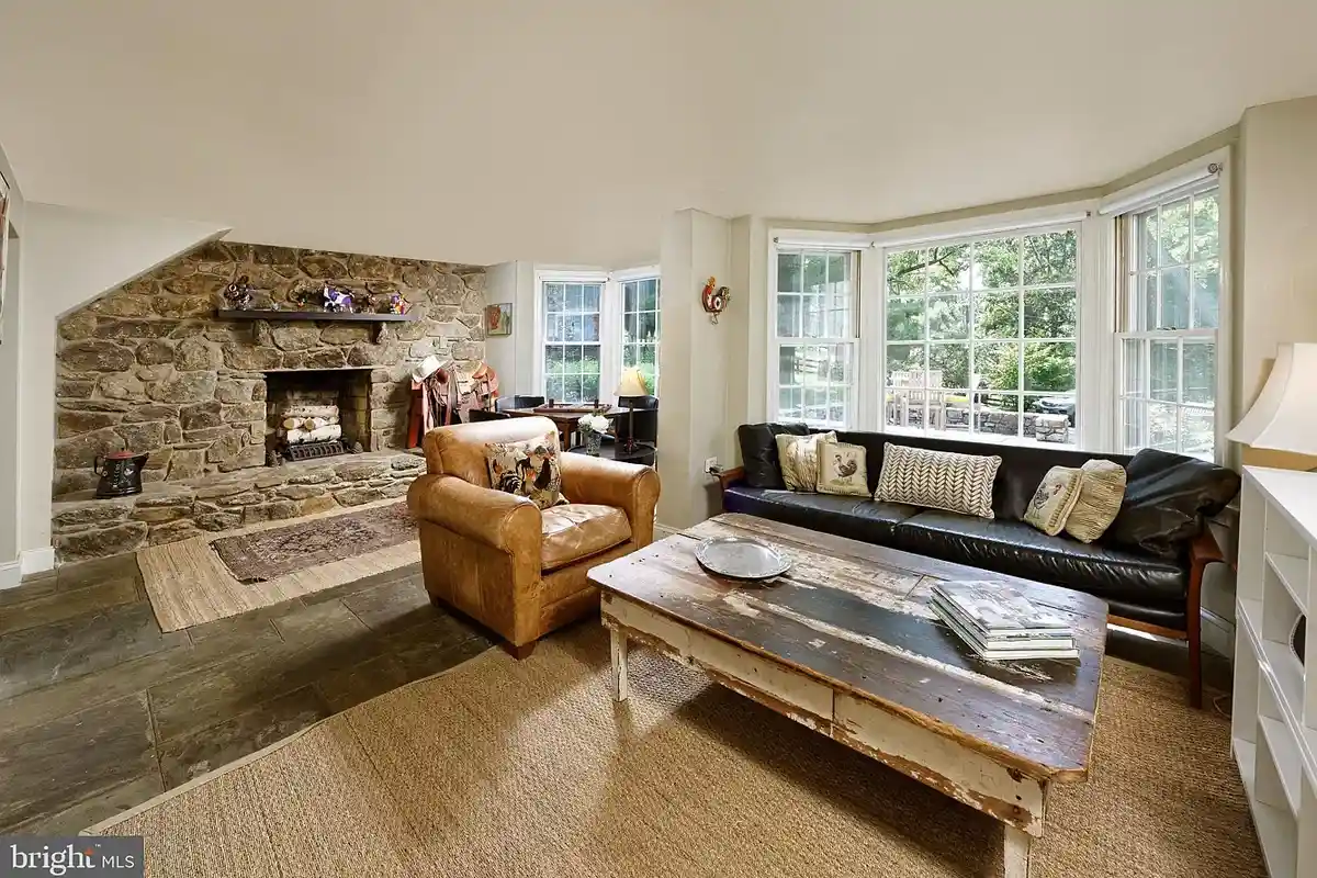 family room with stone fireplace