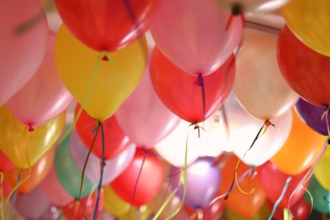 assorted balloons of all colors in close up photography