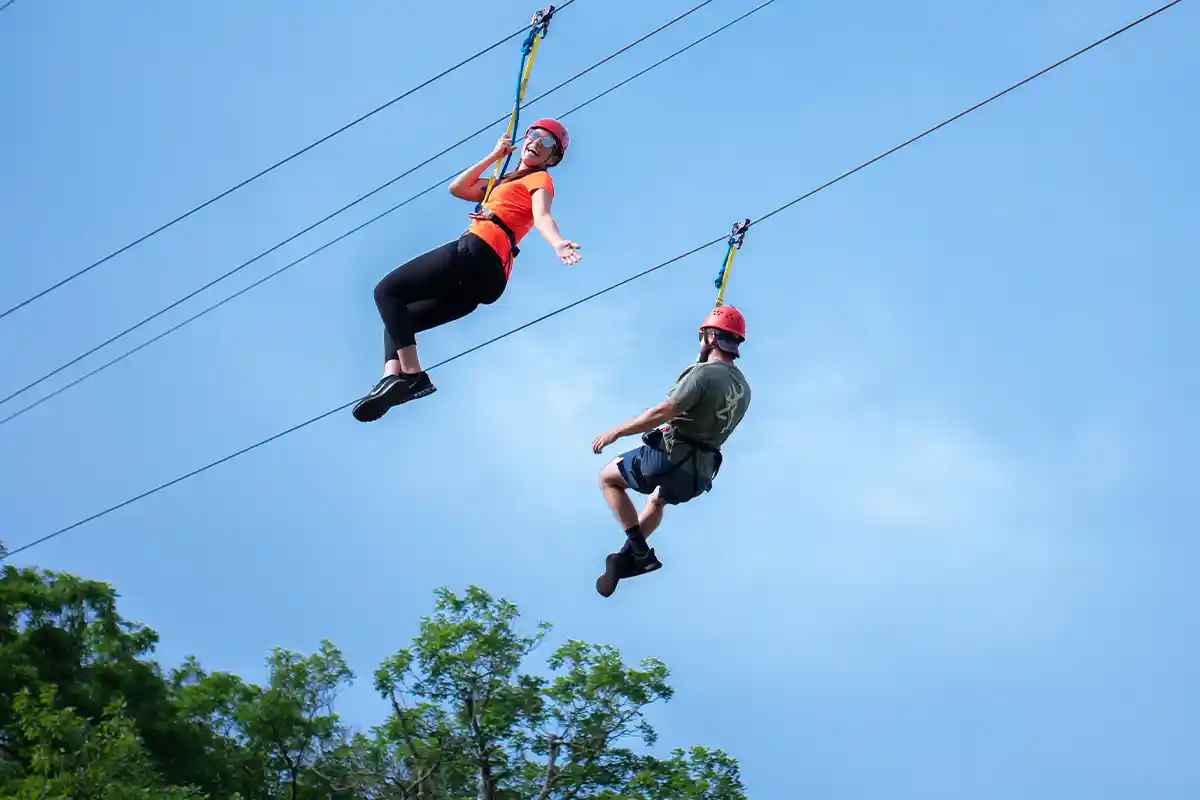 two people on zipline
