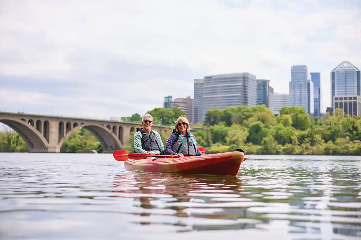 senior couple kayaking on the potomac river