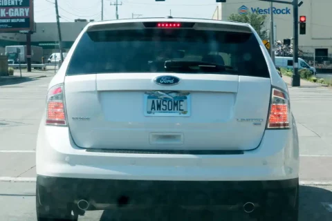 white car with vanity license plate