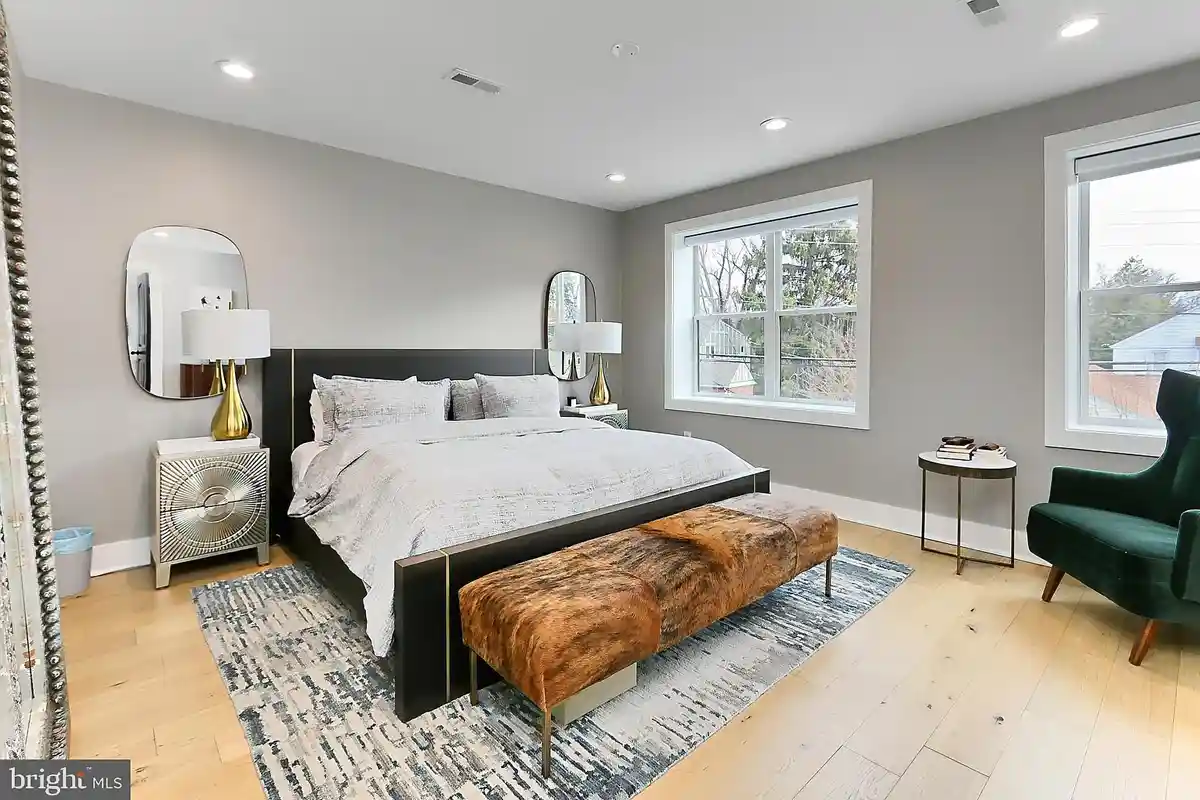 primary bedroom with hardwood floors