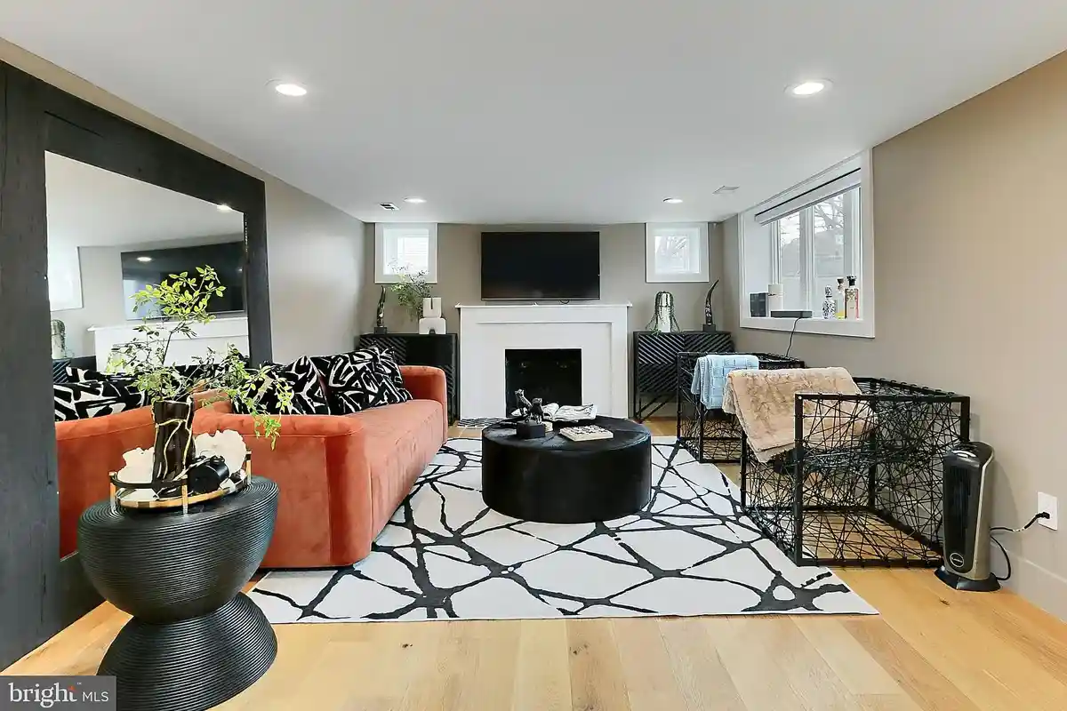 rec room with fireplace and sitting area
