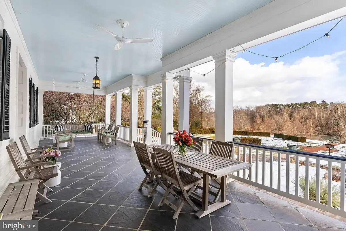 porch overlooking the backyard and Rappahannock river