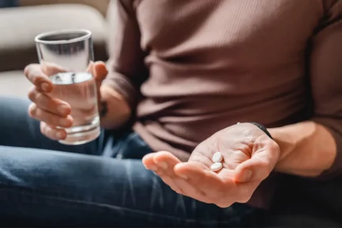 Man taking aspirin
