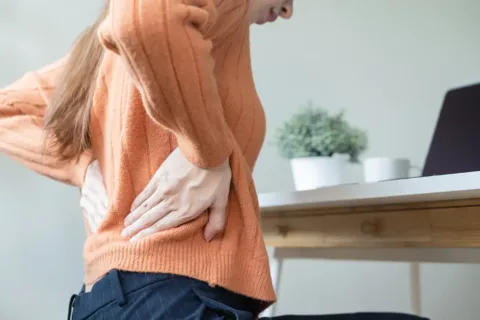 Woman with back pain