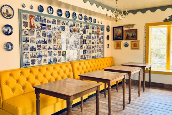 yellow booths and colorful decor at Little Falls Cafe