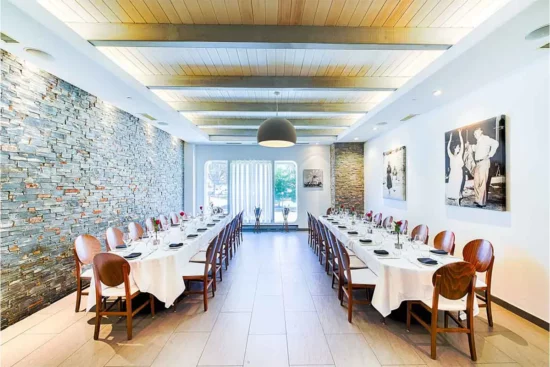 tables and chairs at the Mercouri Room at Nostos