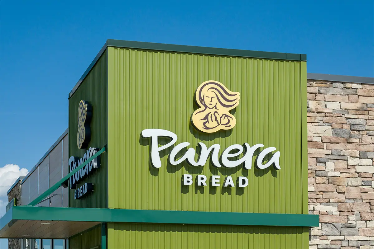 green Panera Bread sign on the outside of a building