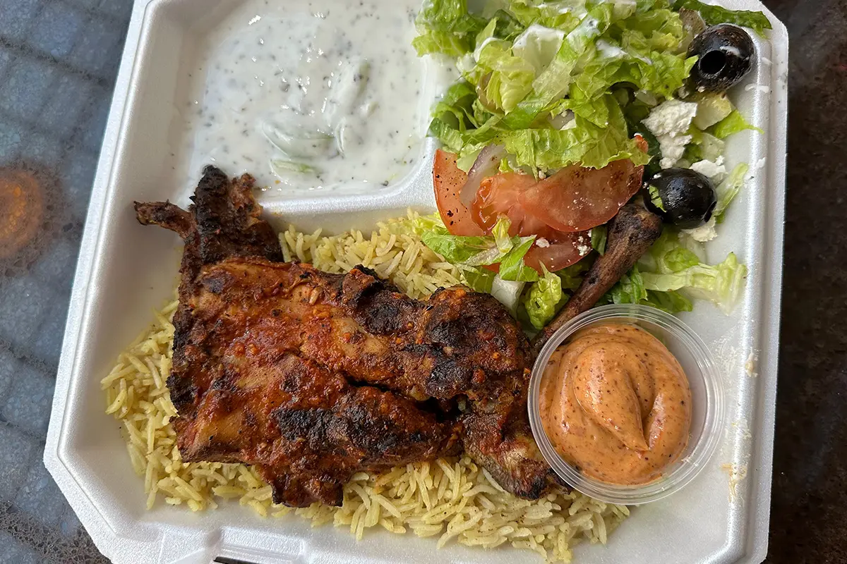 Sultana's quarter chicken with salad and rice
