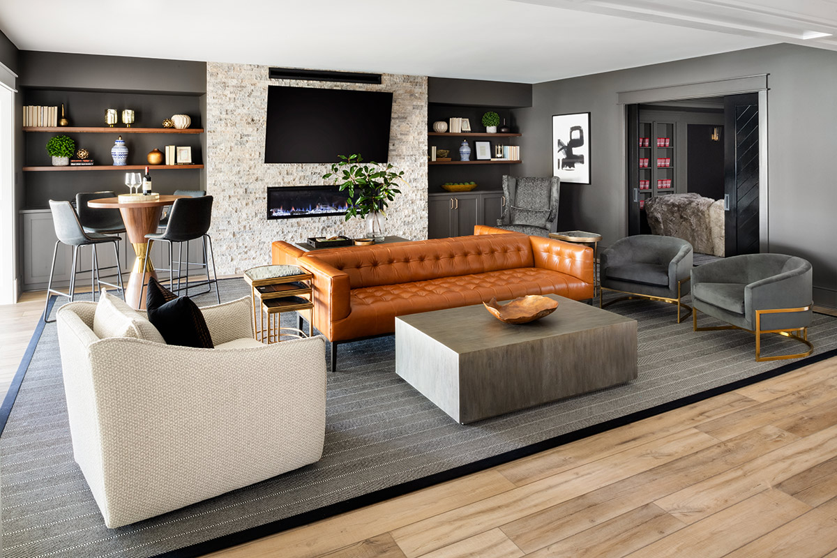 basement with gas fireplace and large seating area