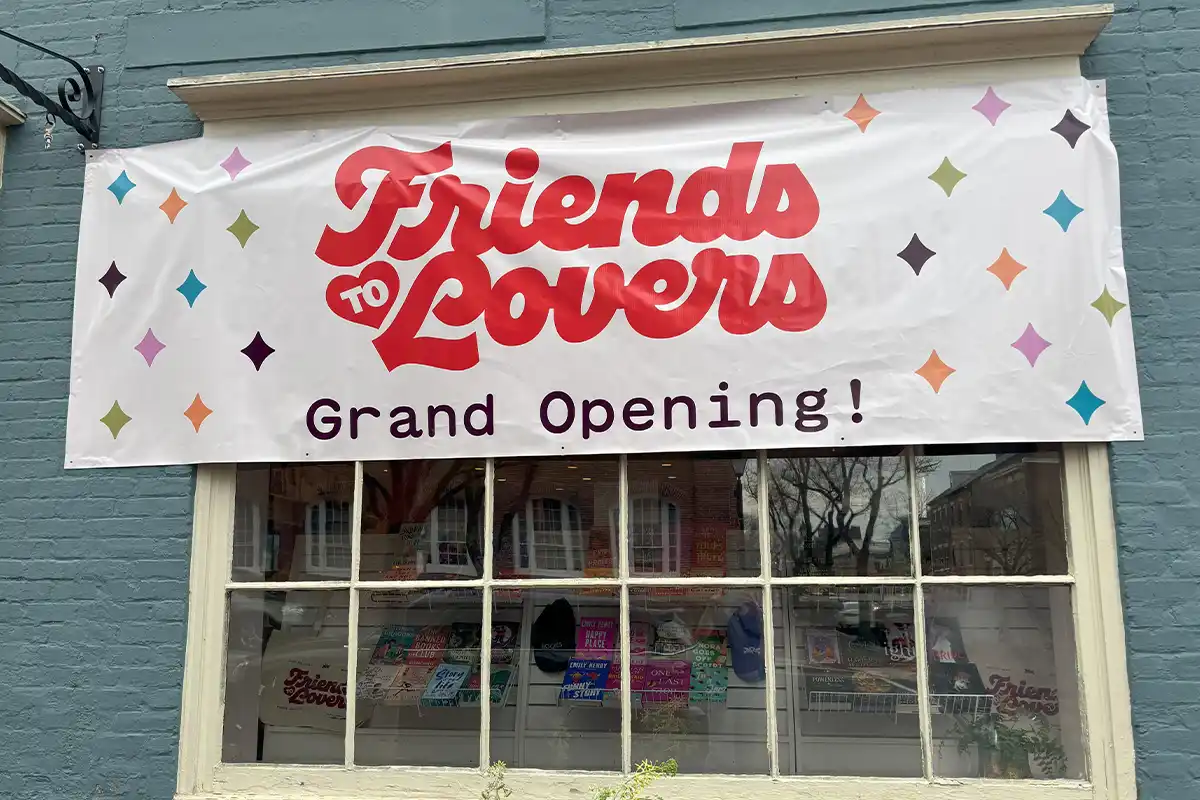 friends to lovers grand opening sign
