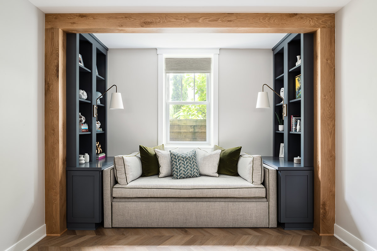 nook with couch and shelves