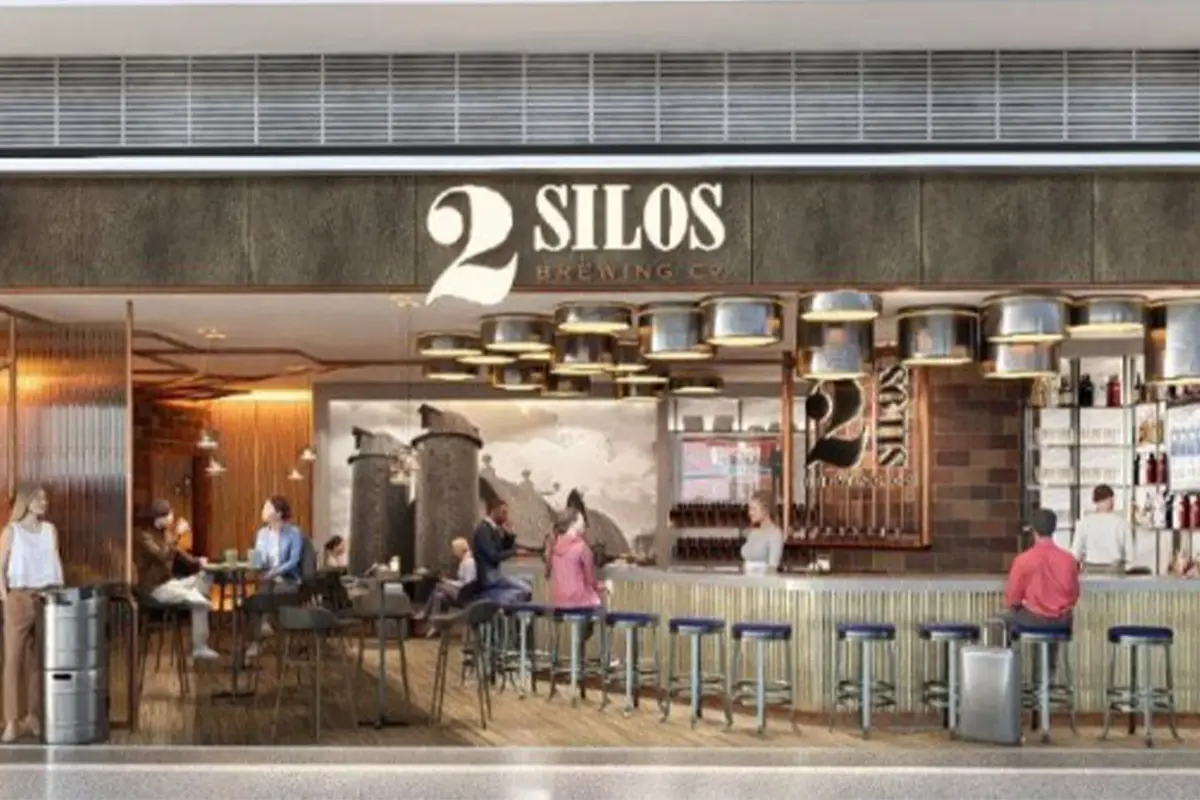 A rendering of people sitting at the bar at 2 Silos at Dulles airport