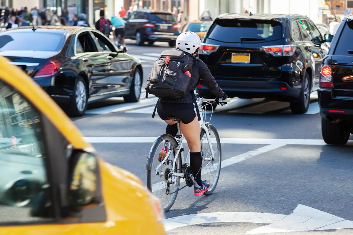 Cyclist on busy street
