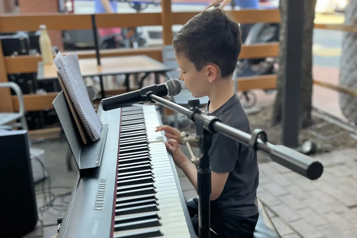 Kid playing piano