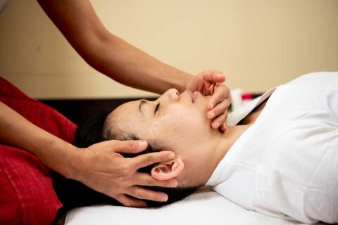 woman getting face massage
