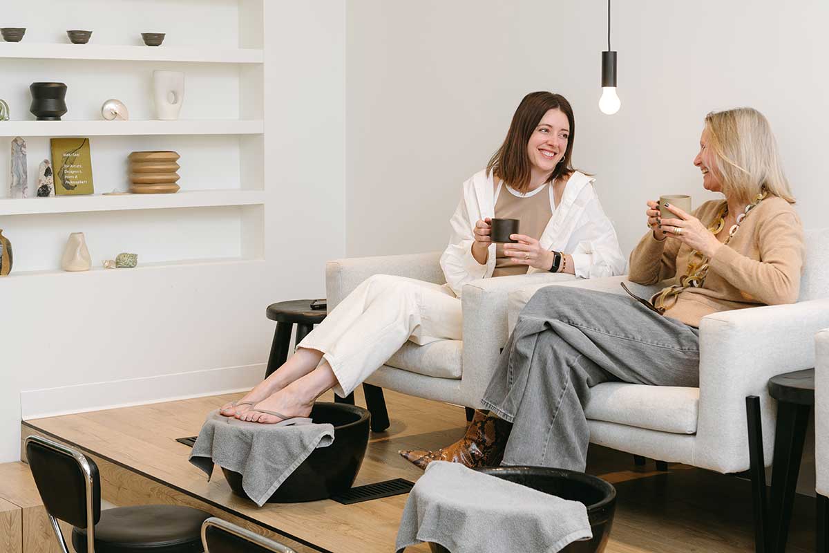 mom and daughter getting pedicure at nothing in between