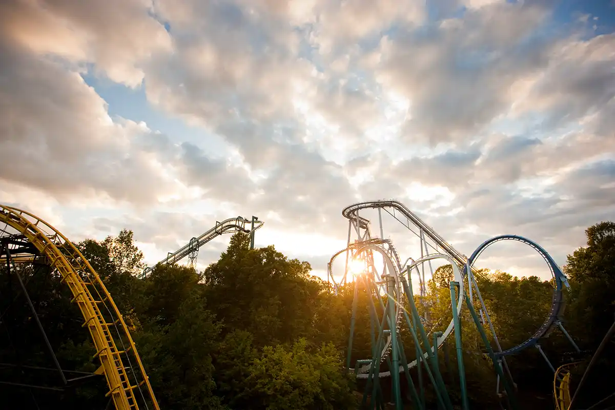 sun setting on roller coasters at busch gardens williamsburg