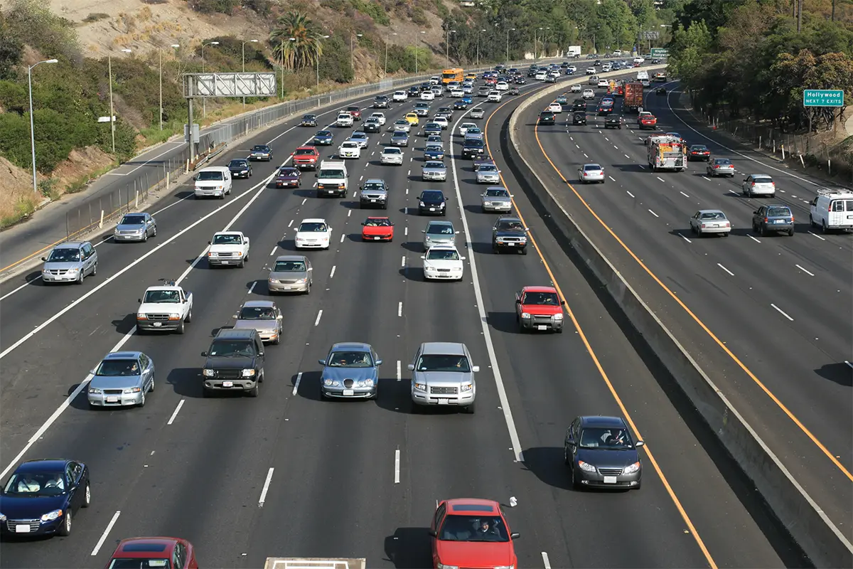 cars driving on a multi-lane highway