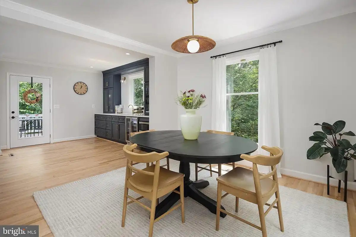 dining room with round table and four chairs