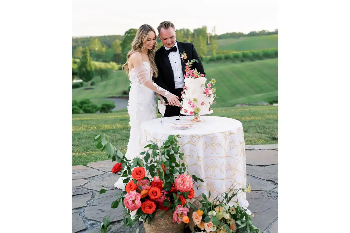 nicole carrigan and dylan ciccone cutting cake