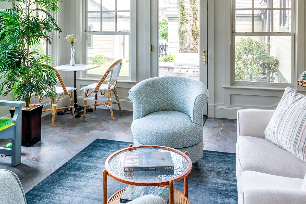 interior of sunroom with sitting area