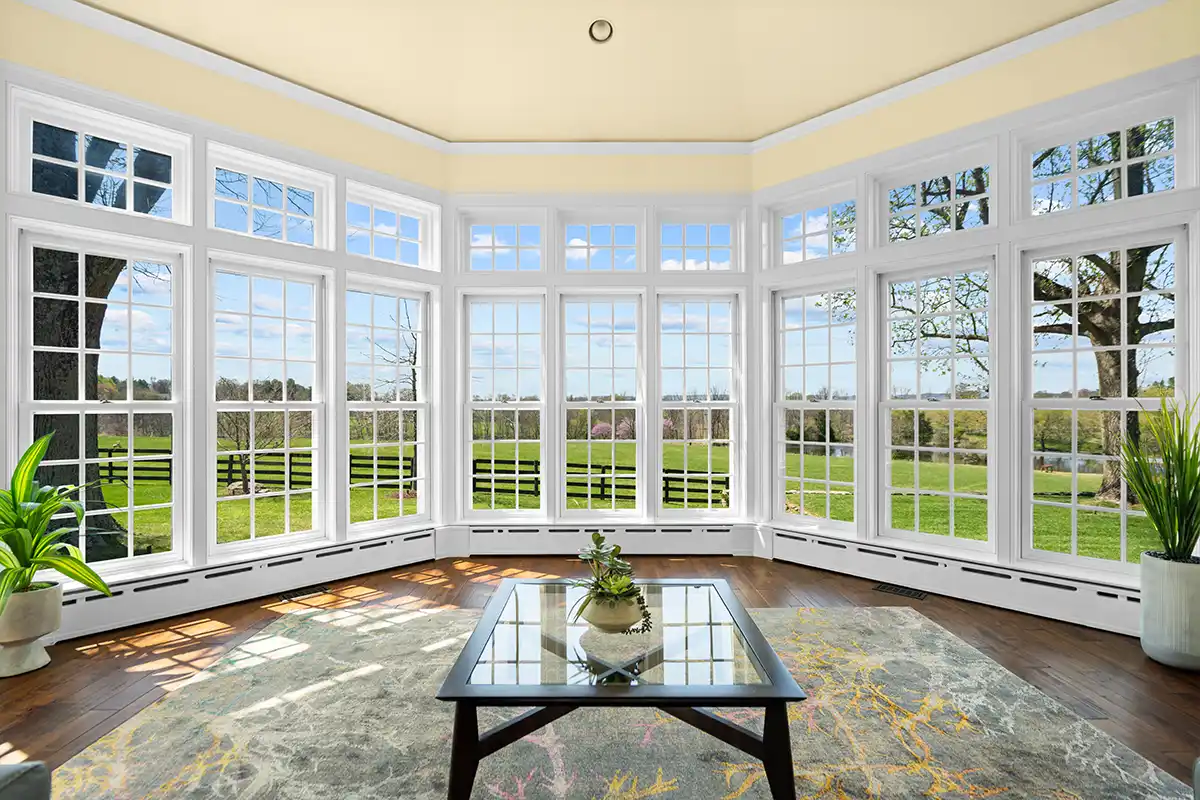 sunroom with wall full of windows