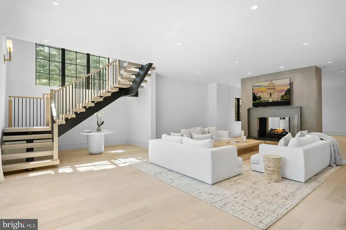 rec room with double-sided fireplace