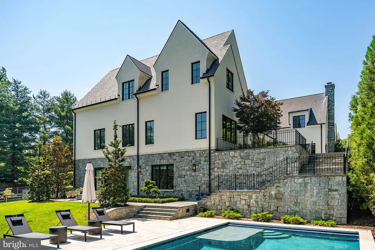 backyard pool with two-level patio