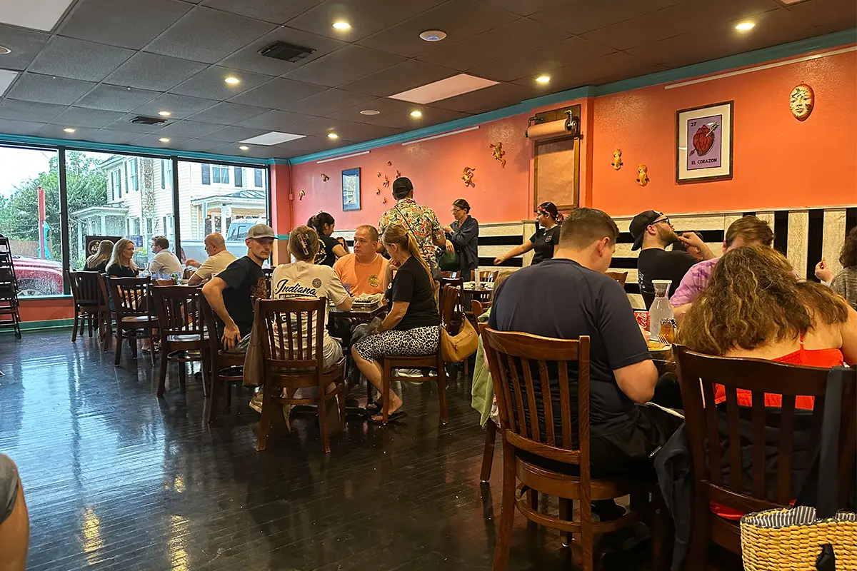people eating in Casa de Avila dining room