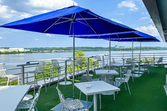 tables and chairs overlook the water at Jula's on the Potomac