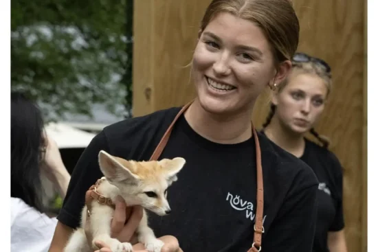 A NOVA Wild Zoo staffer holds an animal