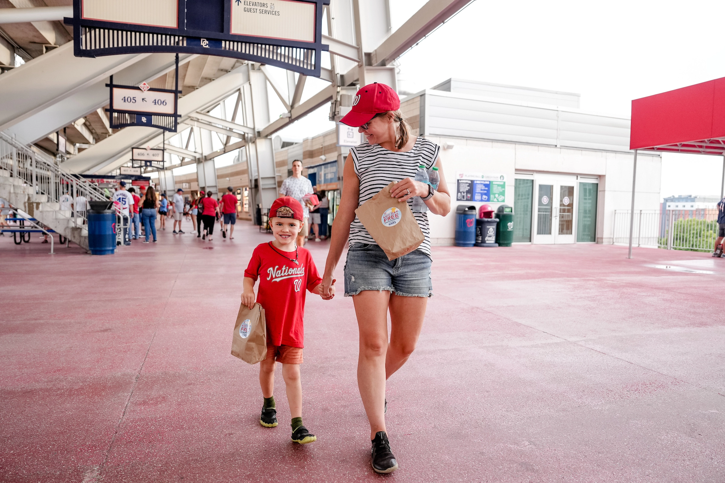 mom with son at nationals park with a kids eat free meal
