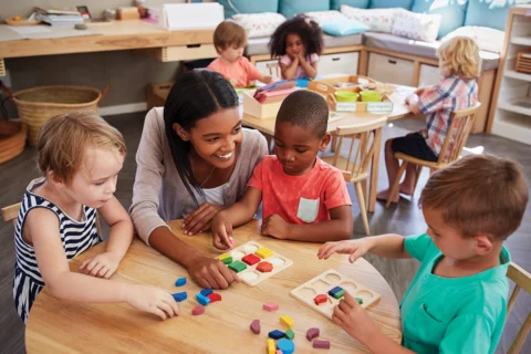 teacher with preschool students