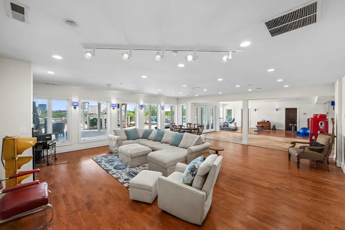 Lower level with recreation room and home gym