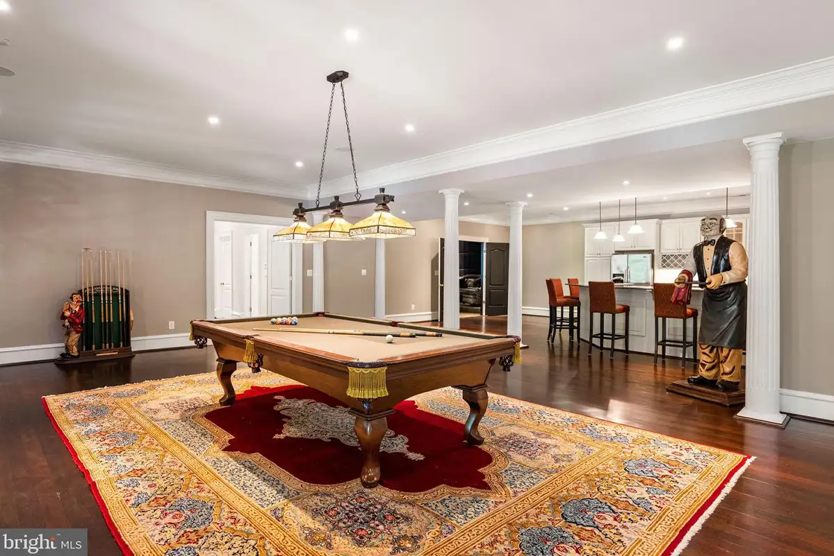 Basement with pool table and bar