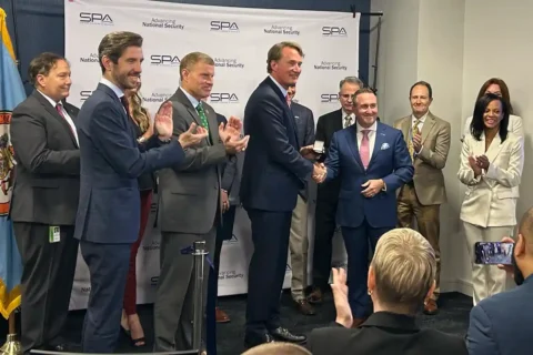 Gov. Glenn Youngkin and officials with SPA CEO